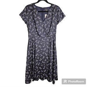 Ann Taylor navy floral faux wrap dress, midi length a-line, size 4